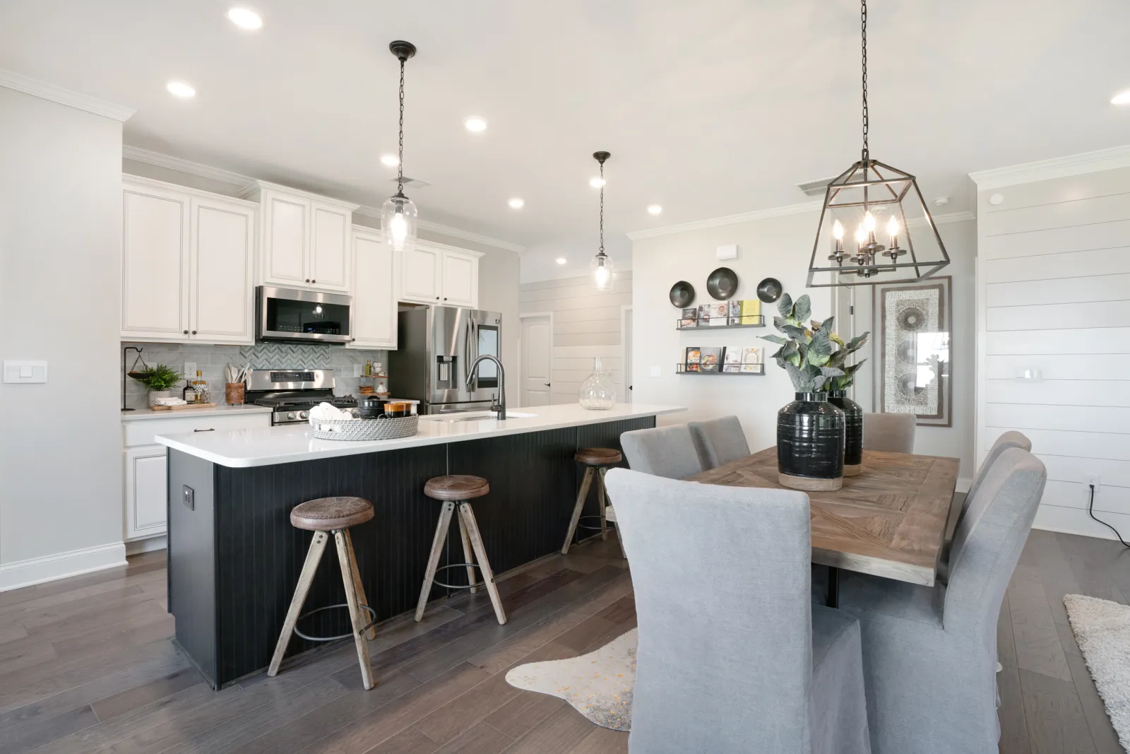 a kitchen with a table and chairs