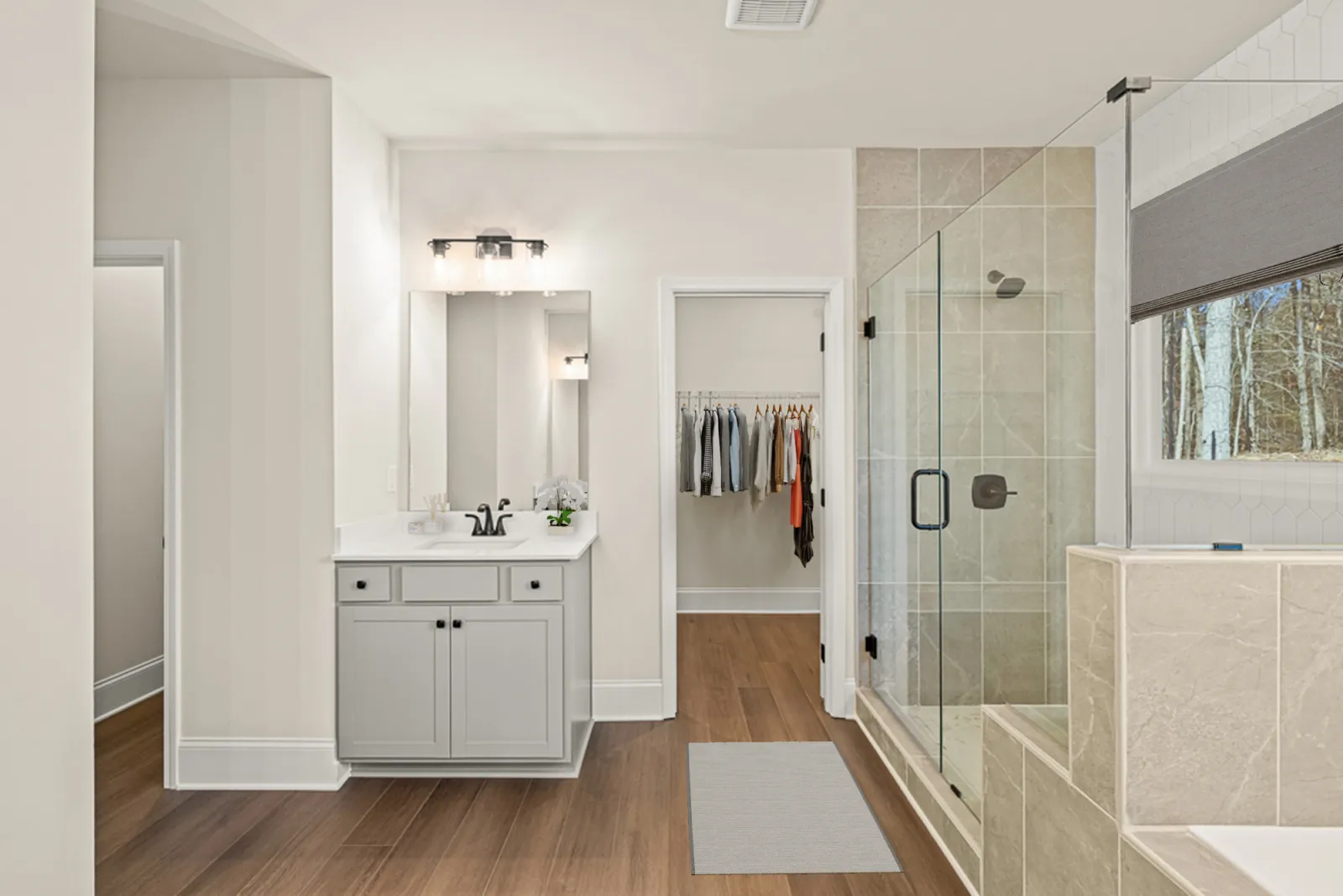 a bathroom with a glass shower