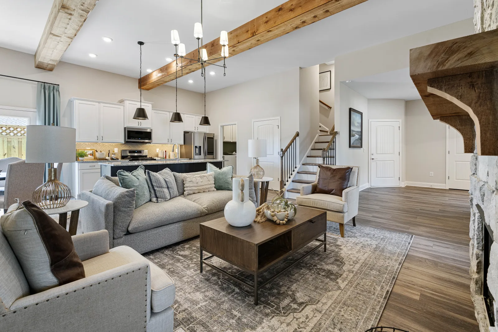 a living room with a staircase