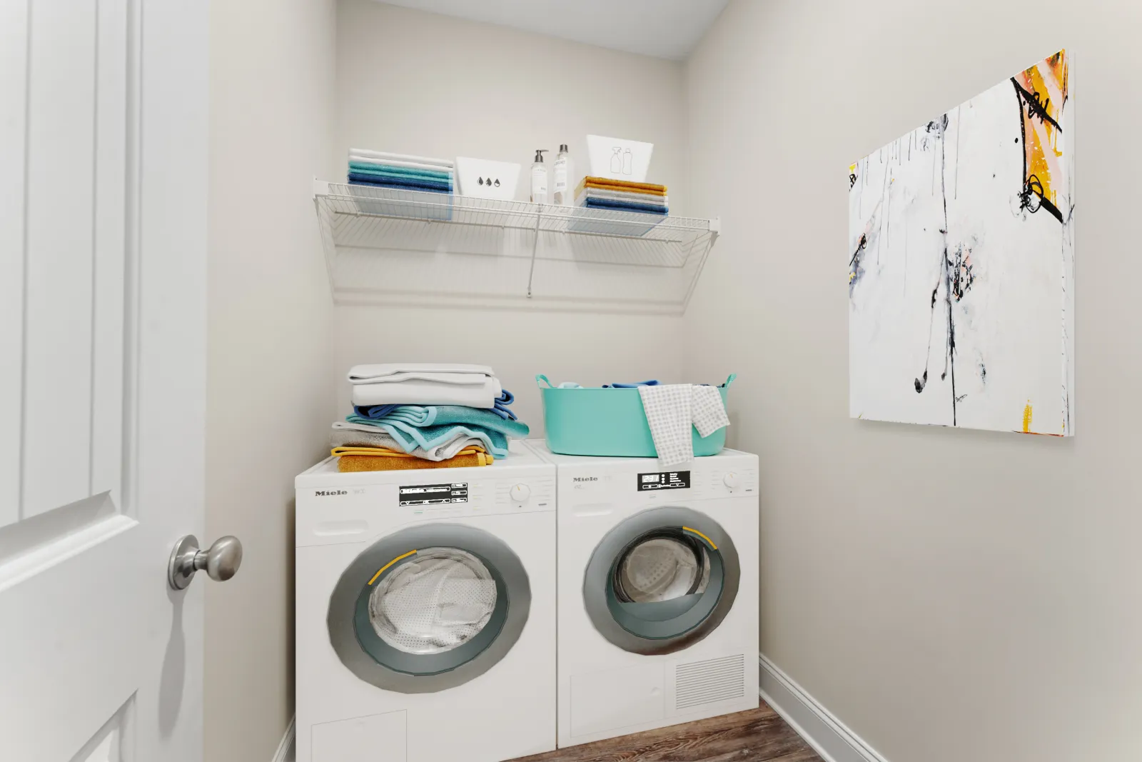 a washing machine and dryer in a room