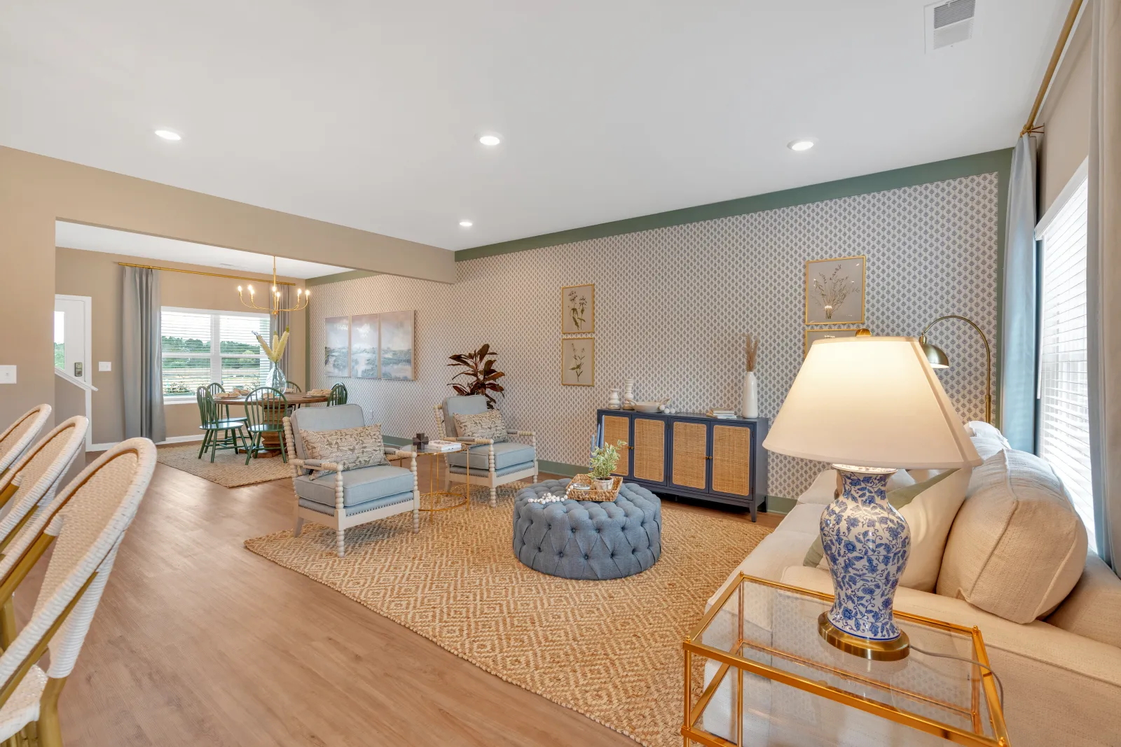 Bright and modern living room with stylish furniture and decorative accents.