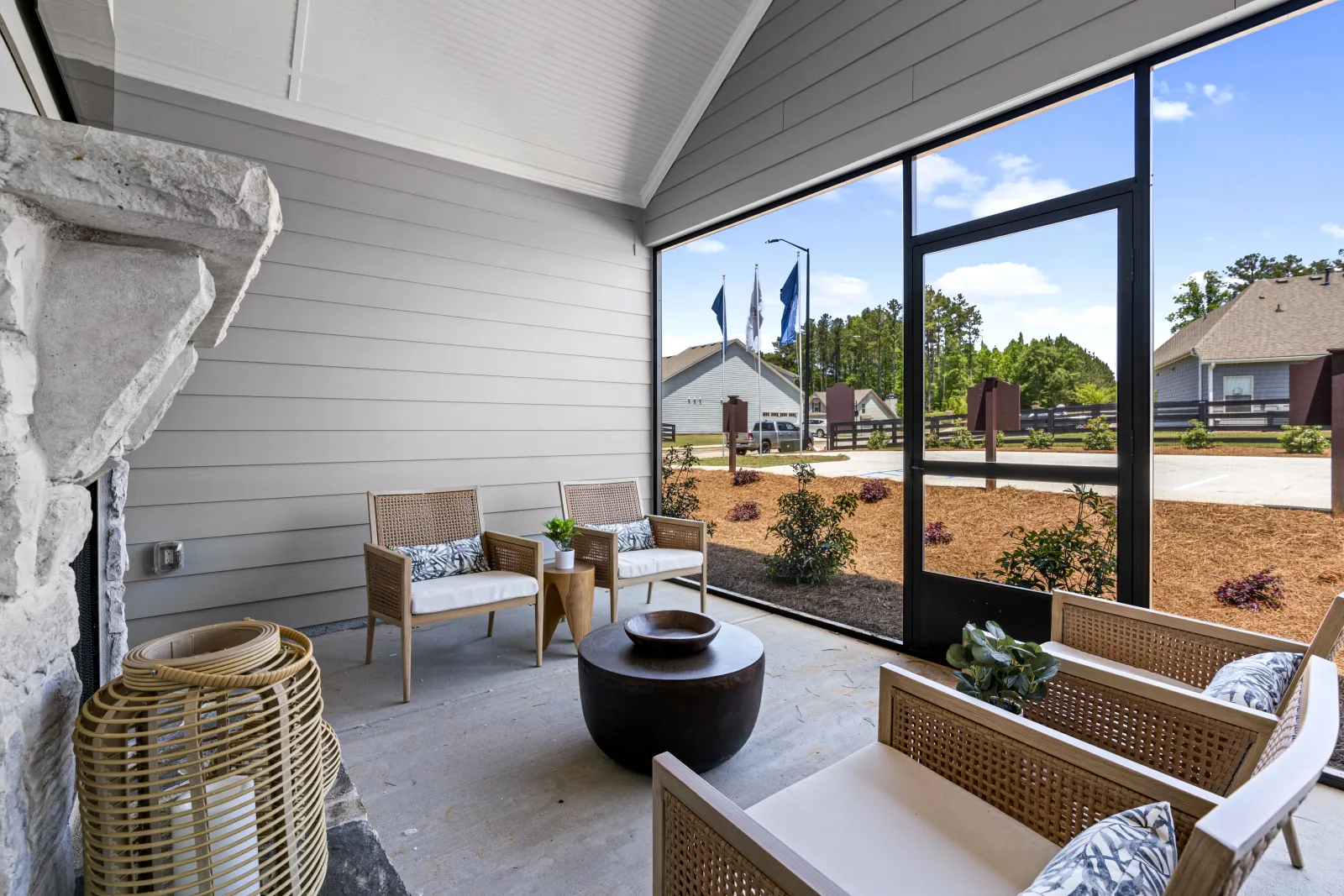 a room with a large window and a table with chairs and a table