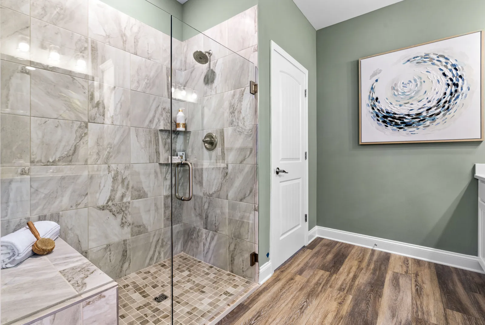 a bathroom with a glass shower