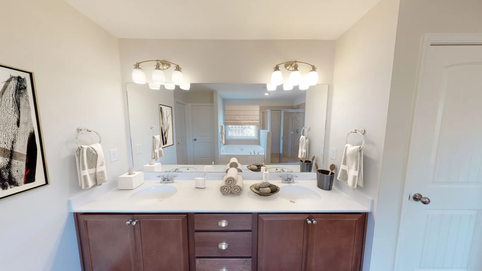 a kitchen with a sink and a mirror