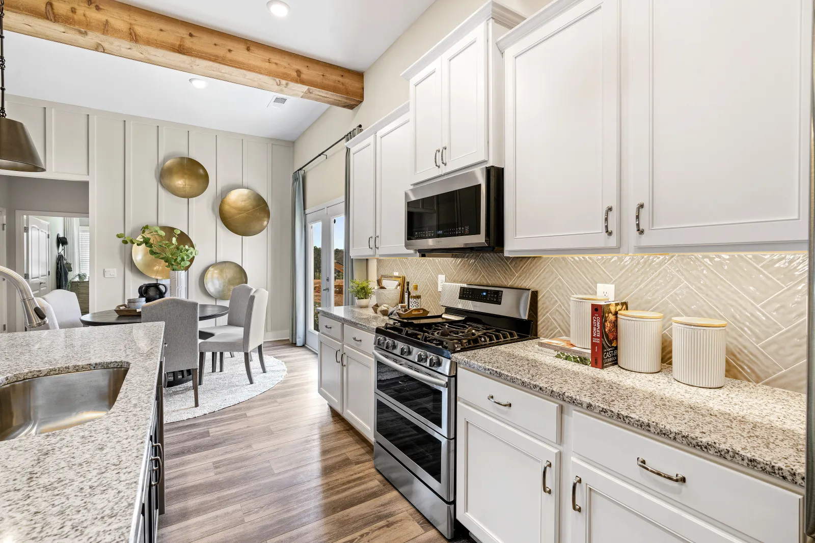 a kitchen with white cabinets