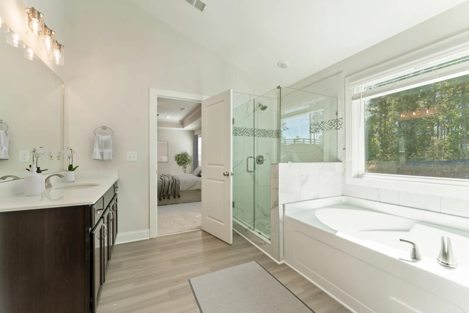 a bathroom with a tub sink and a toilet