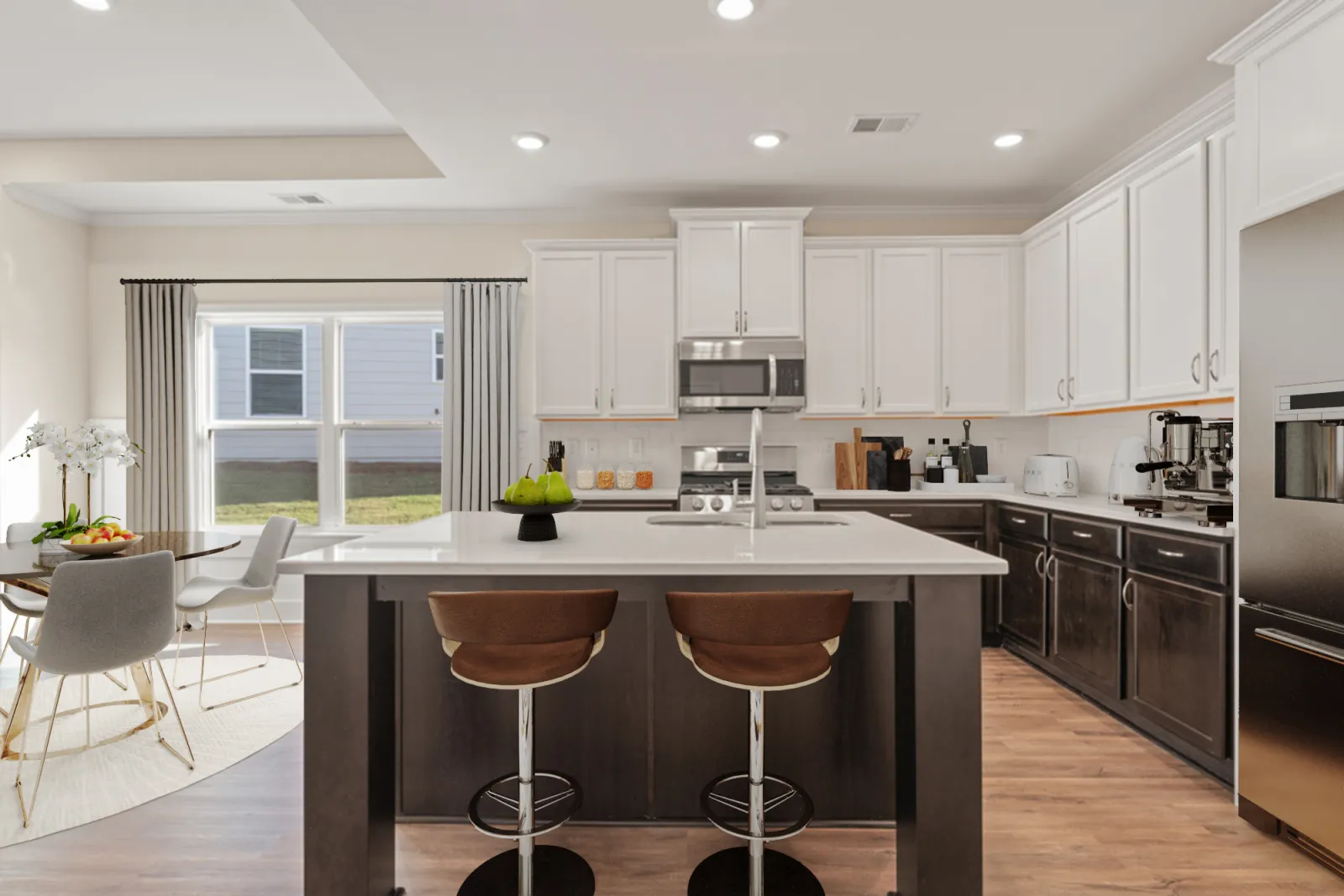 a kitchen with white cabinets