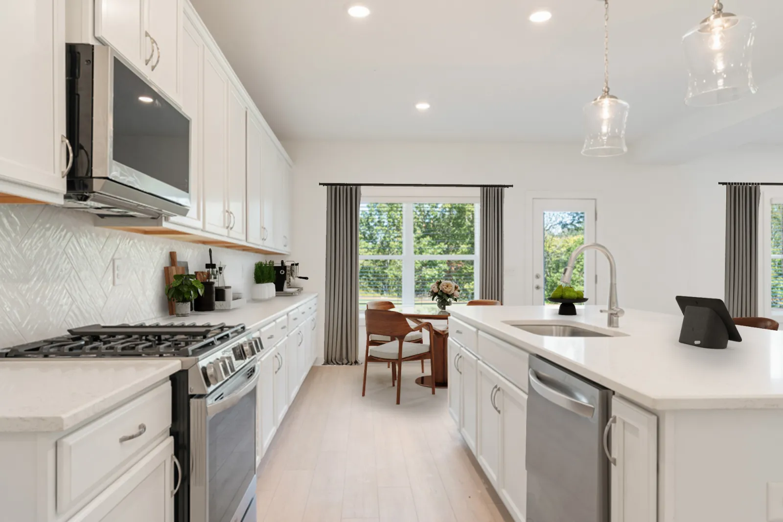 a kitchen with white cabinets