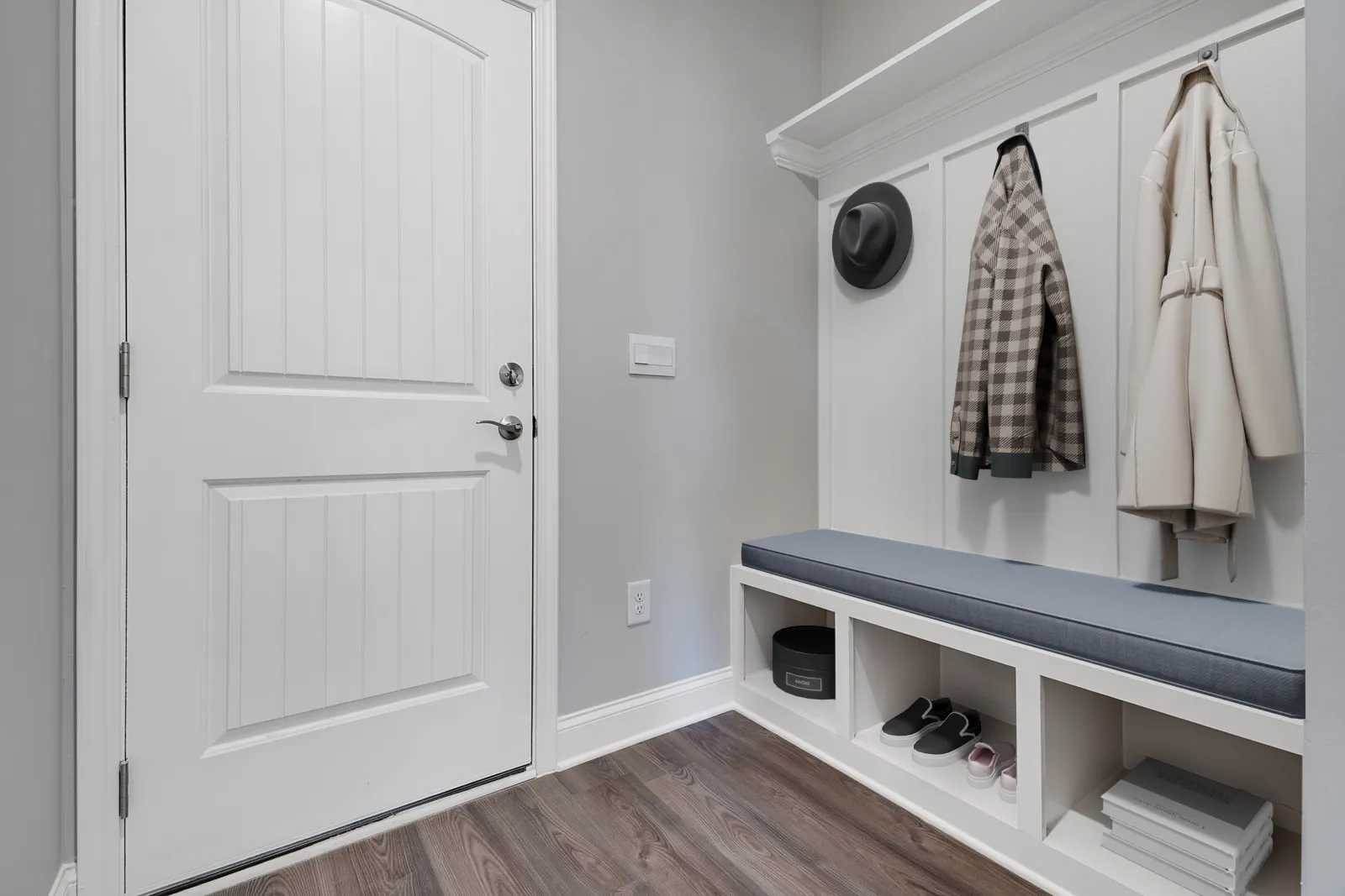a closet with white towels