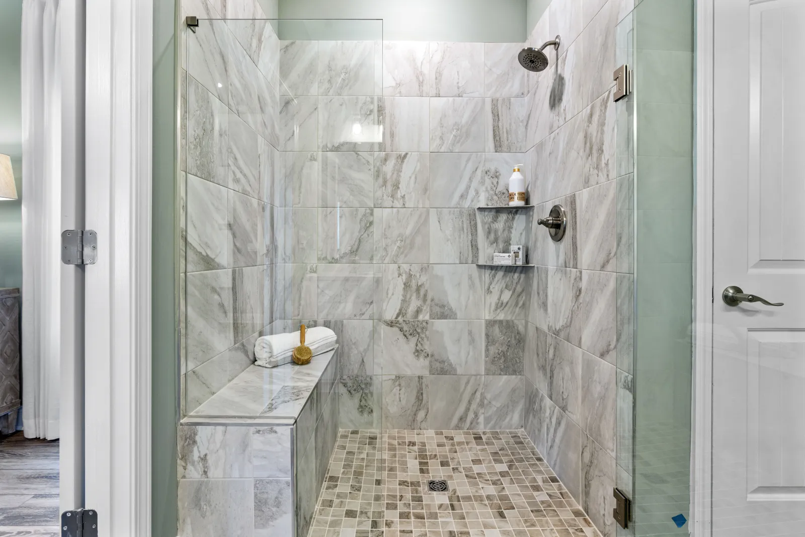 a shower with a glass door