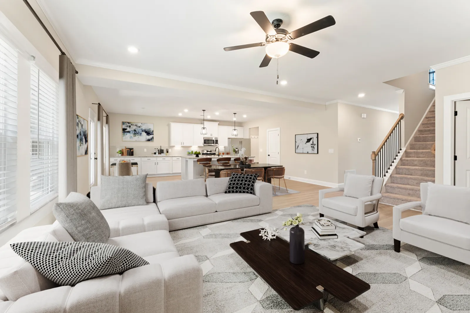 a living room with a large staircase