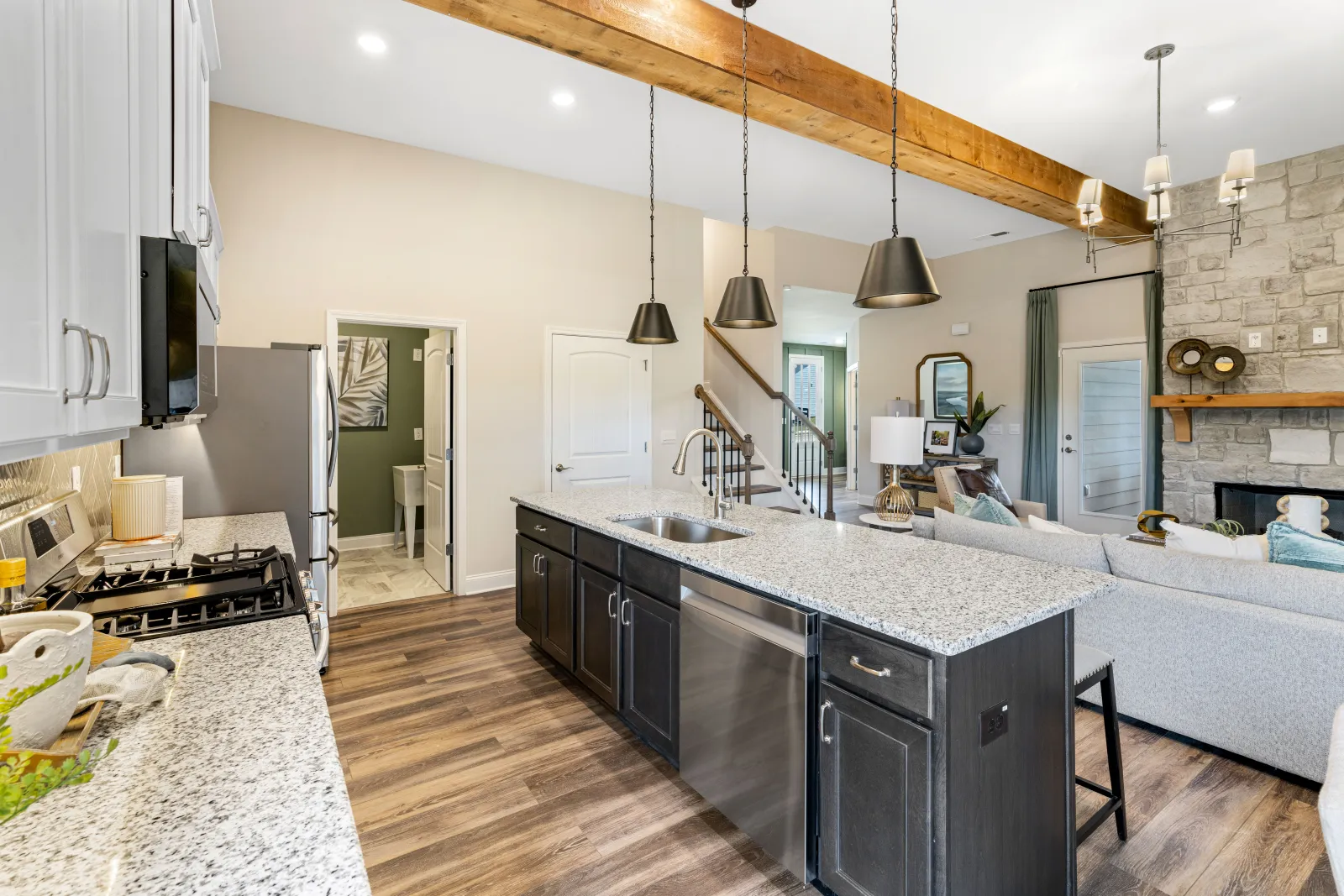 a kitchen with a marble island