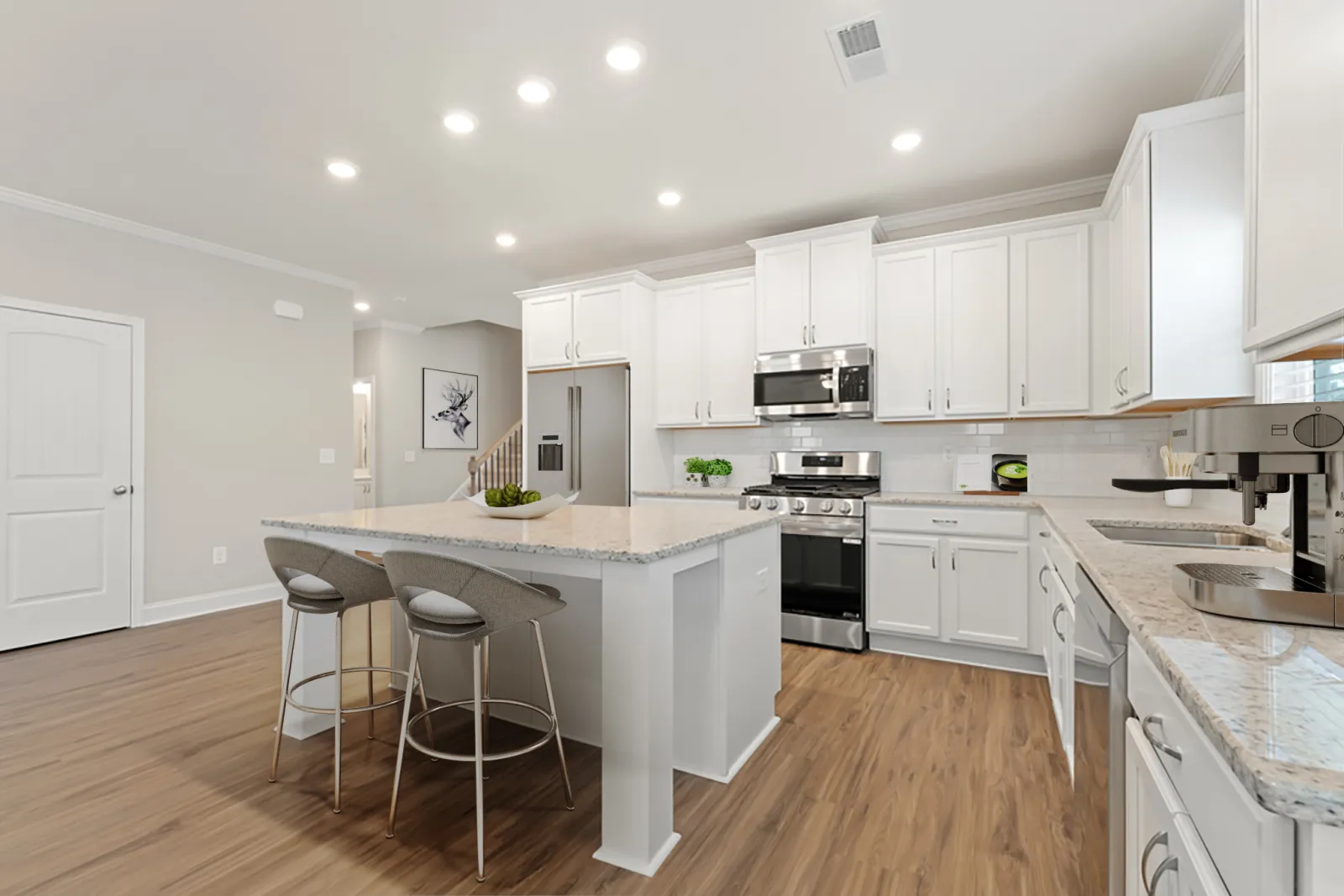 a kitchen with white cabinets