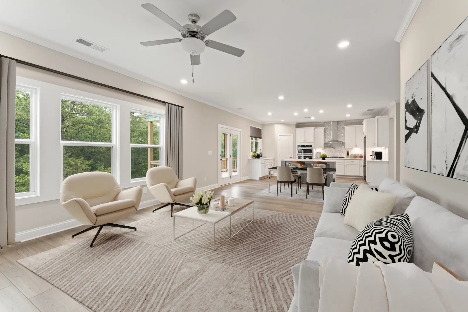 a living room with a large white couch and a table