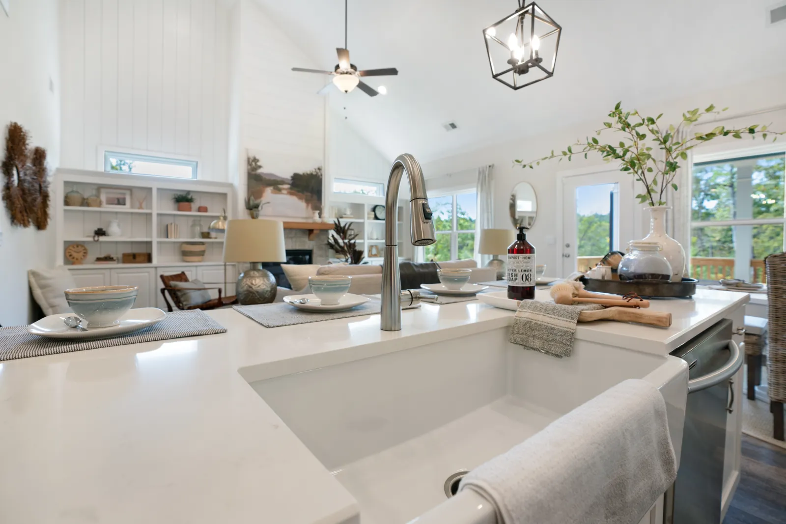 a kitchen with a large white counter