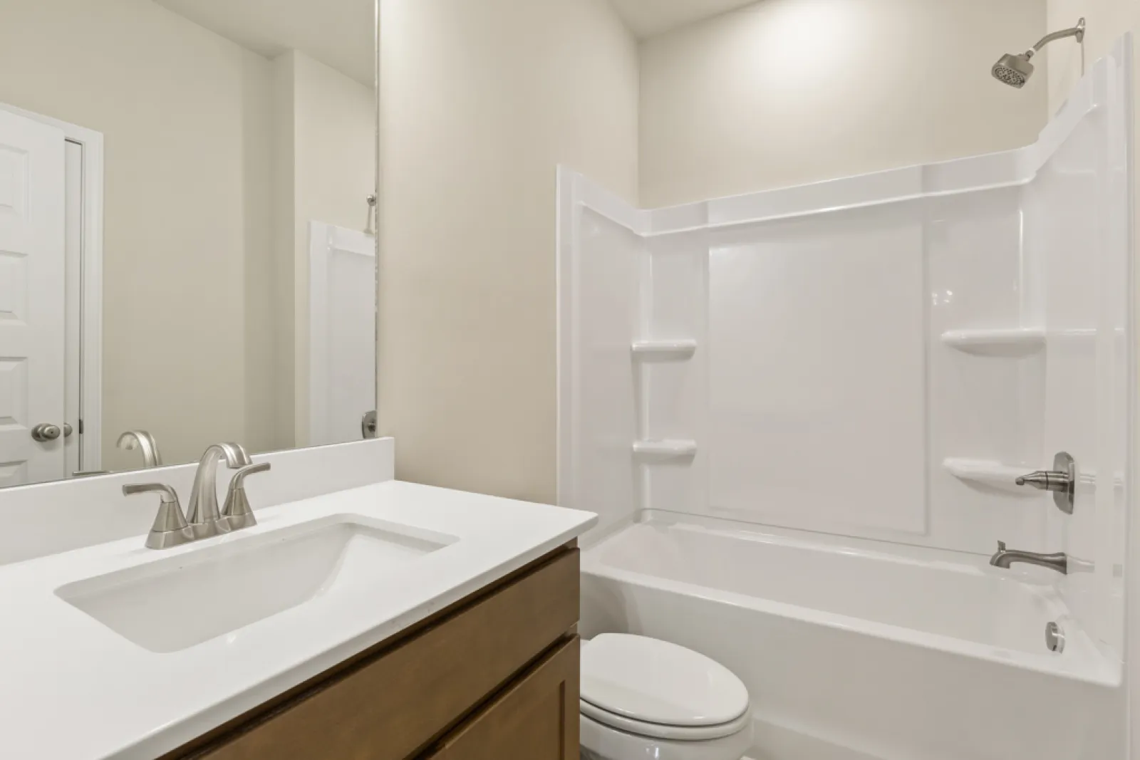 a bathroom with a sink toilet and bathtub