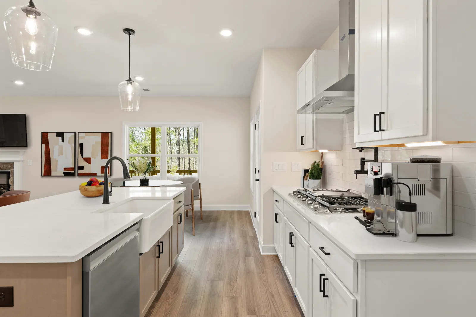 a kitchen with white cabinets