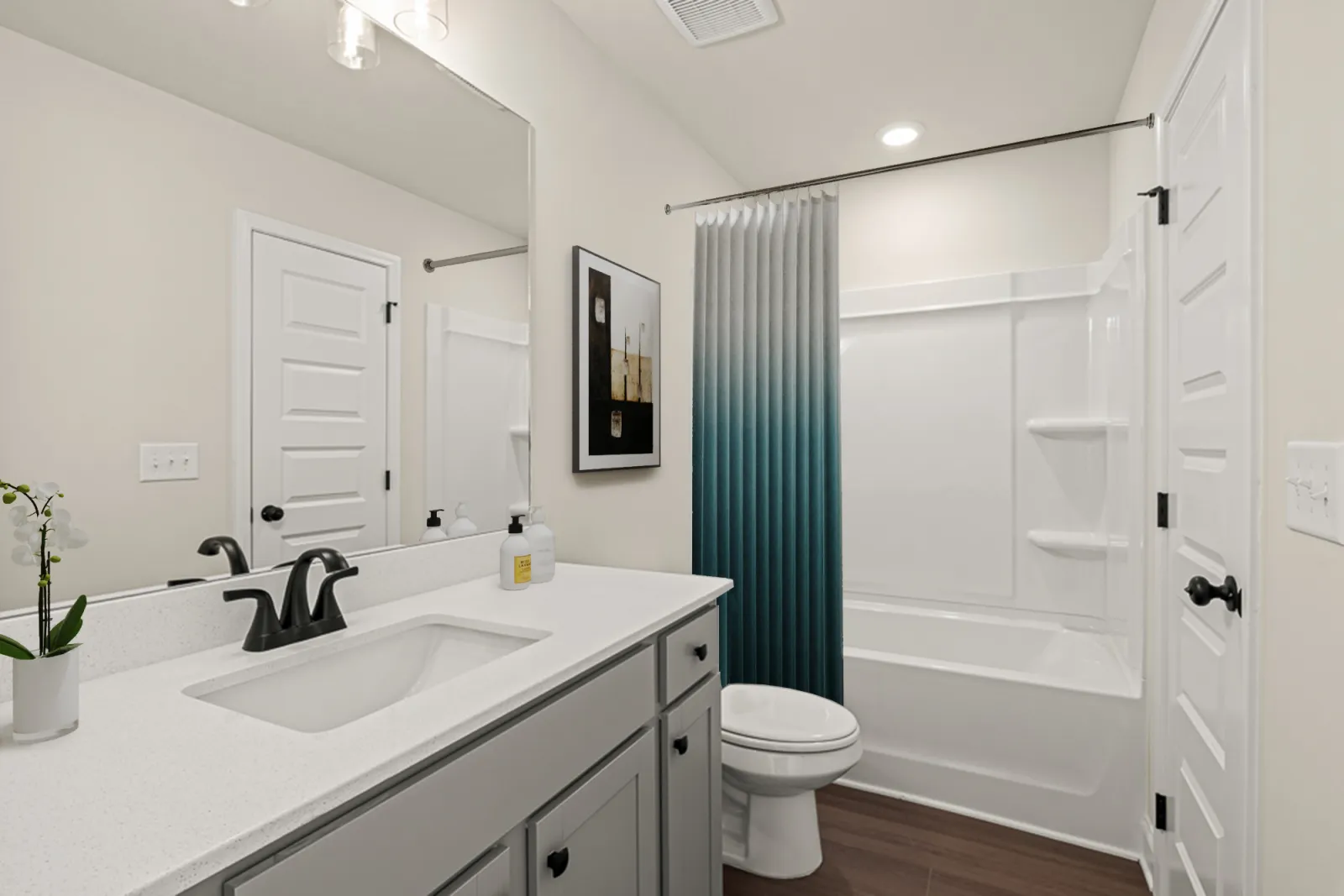 a bathroom with a sink toilet and bathtub