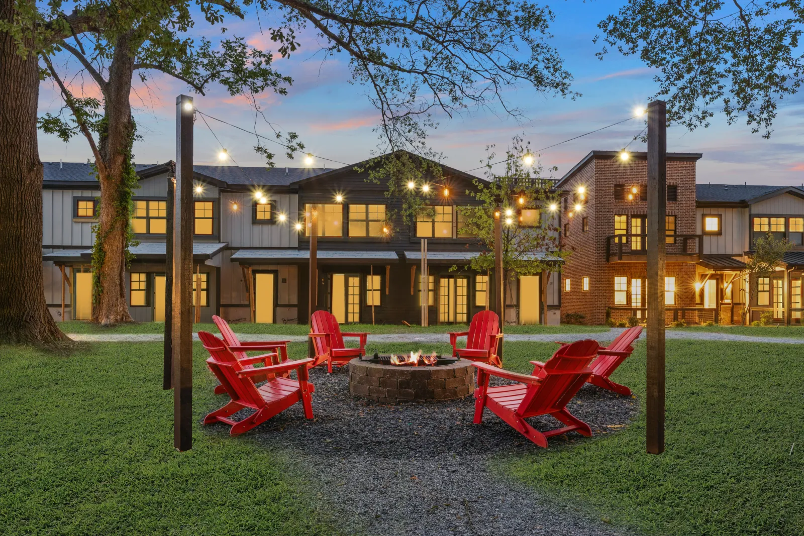 a building with a few tables and chairs outside