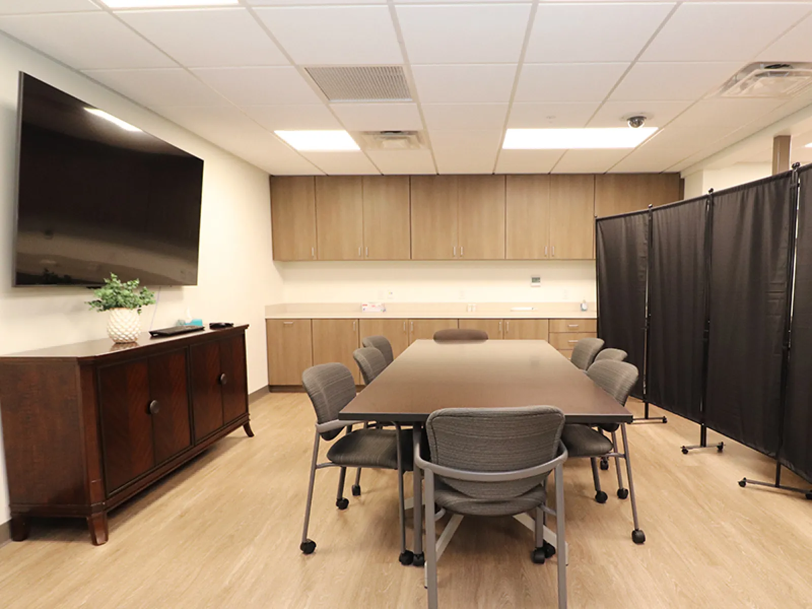 a room with a table and chairs