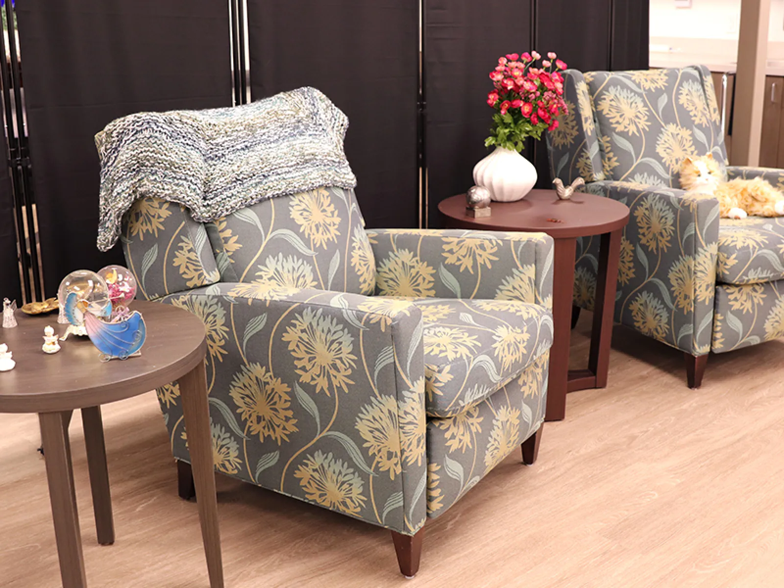 a couple of chairs with flowers on them