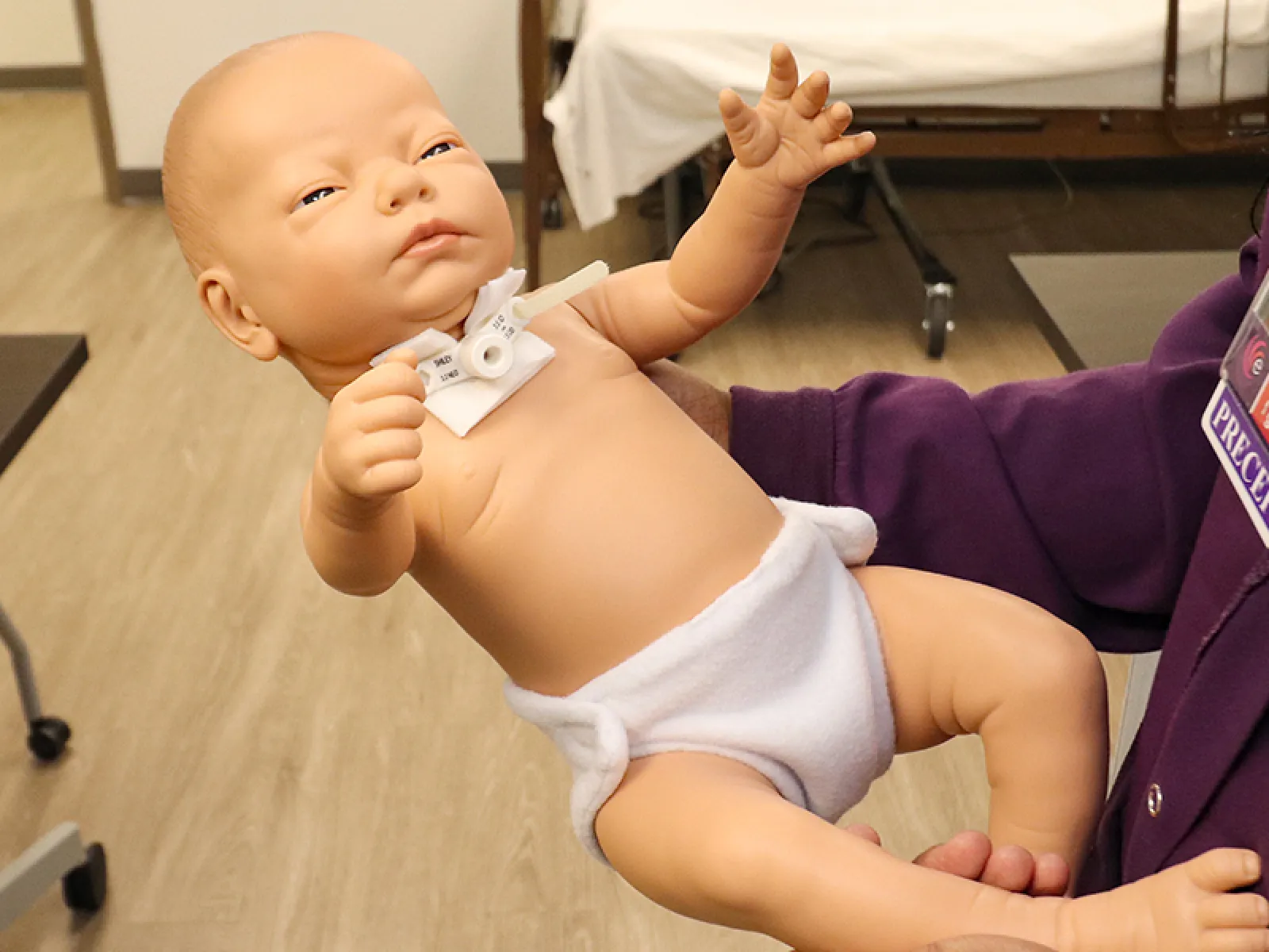 a baby holding a remote control