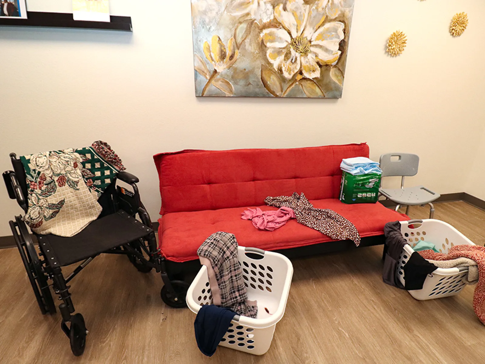 a living room with a red couch