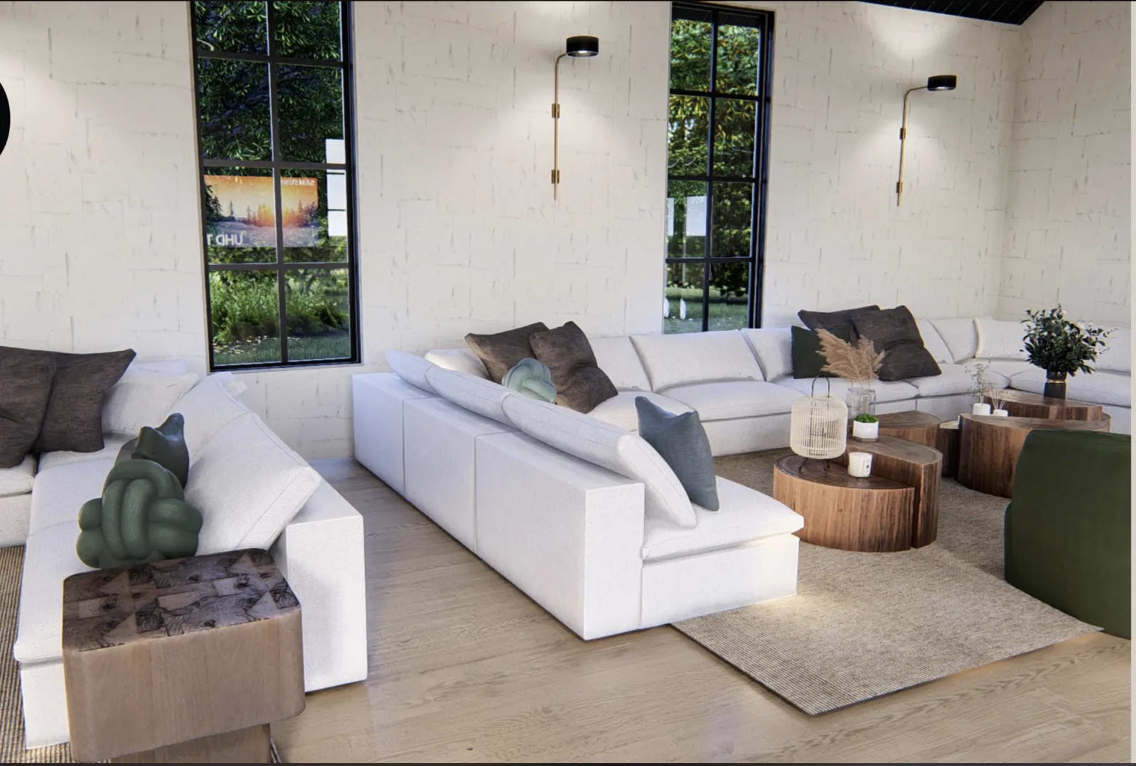 a living room with a white couch and green pillows