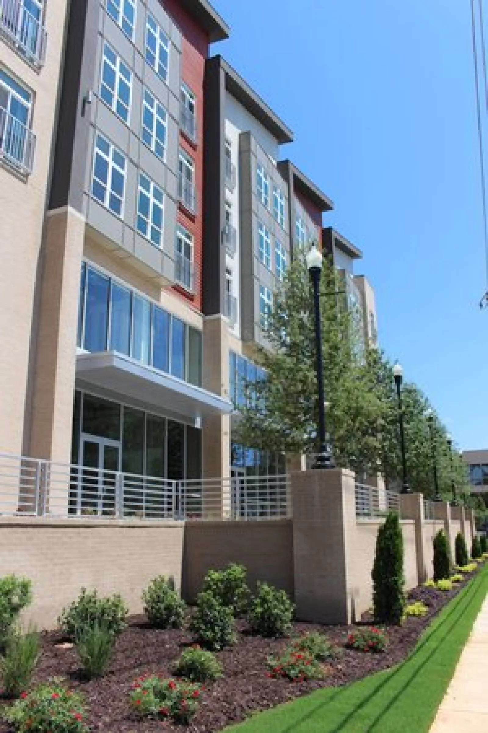 a building with a garden in front