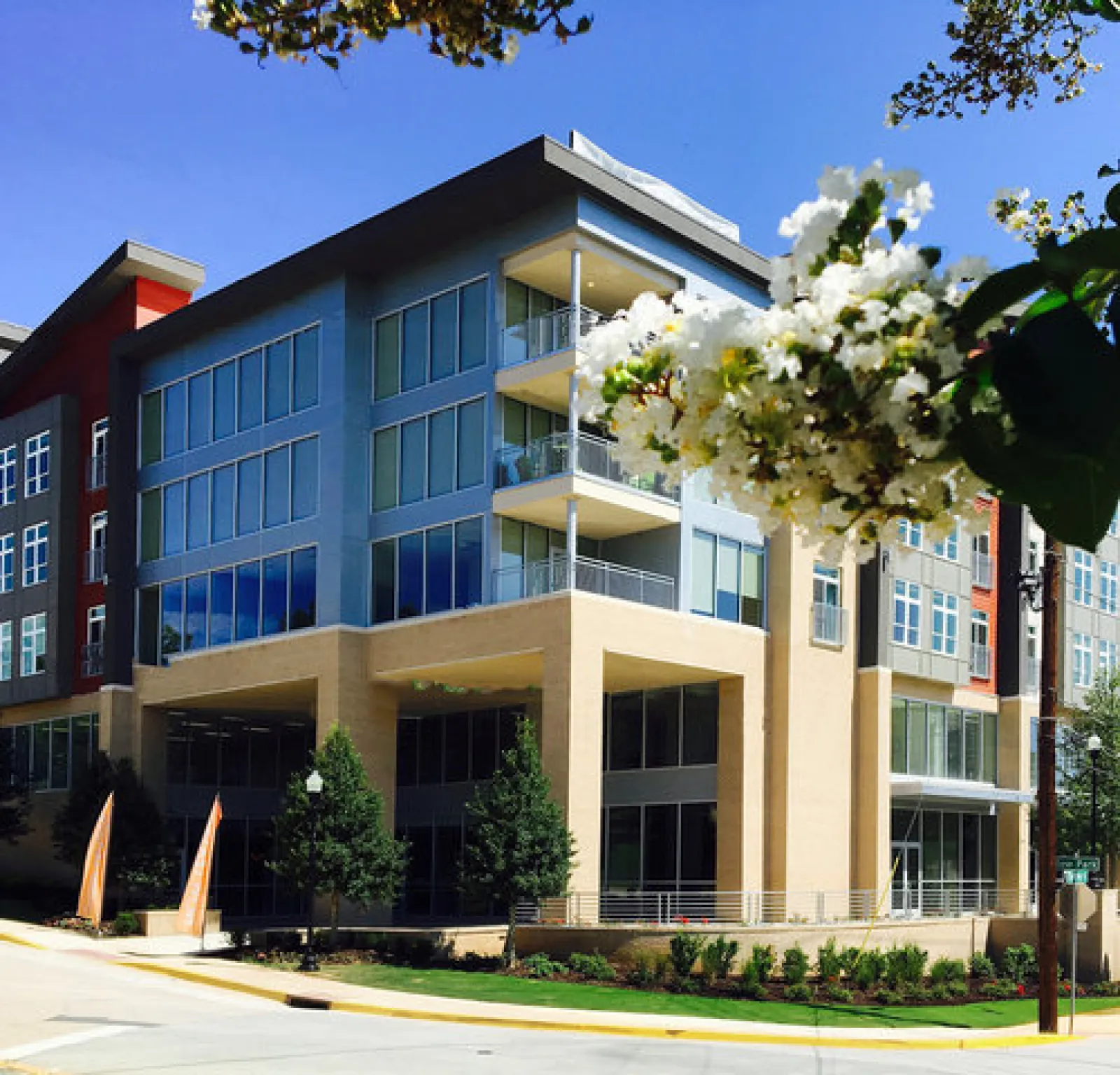 a building with a tree in front