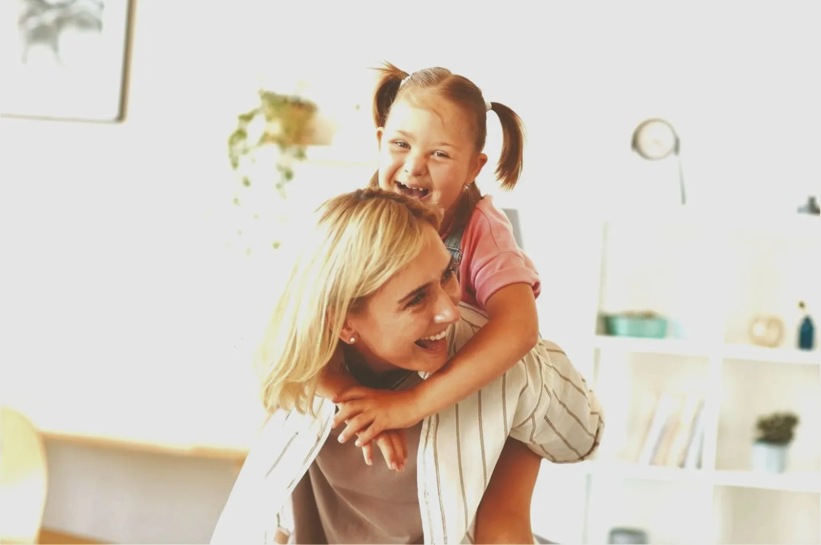 a woman holding a child