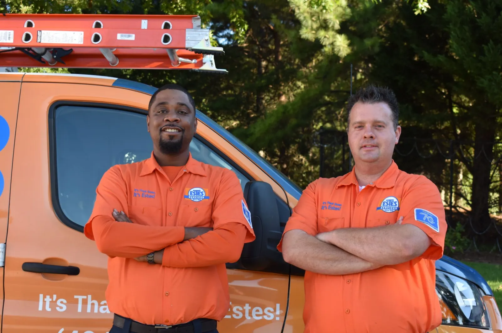 Estes Services HVAC Pros in front of a truck