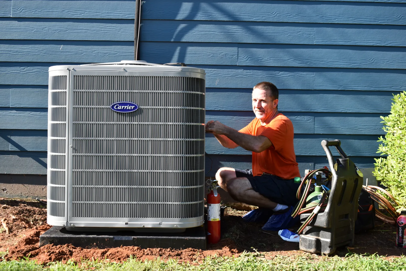 Jared, Estes Technician is installing a Carrier Heat Pump