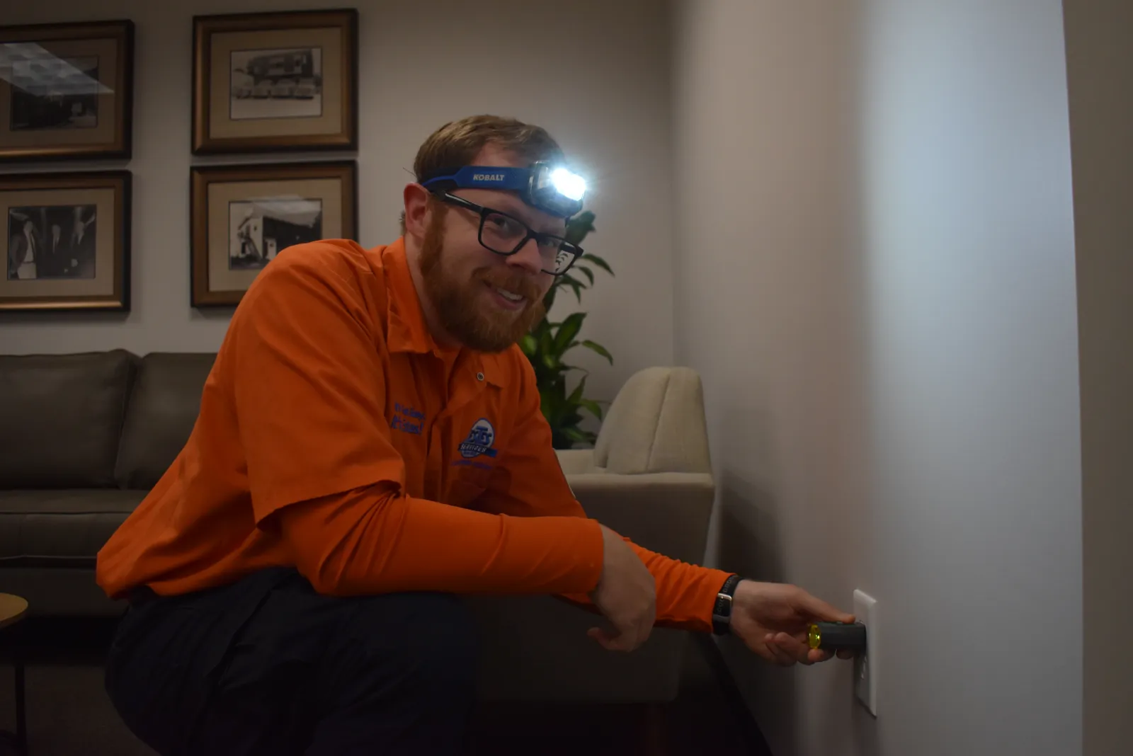 Estes Electrician Checking an outlet in Atlanta
