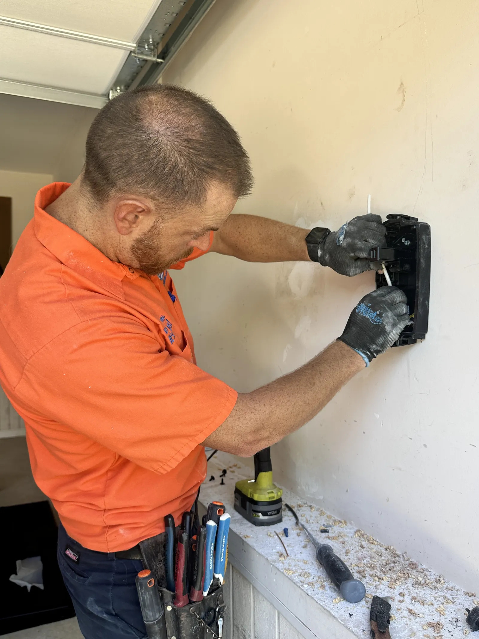 Estes Electrician installing a EV Tesla Charger