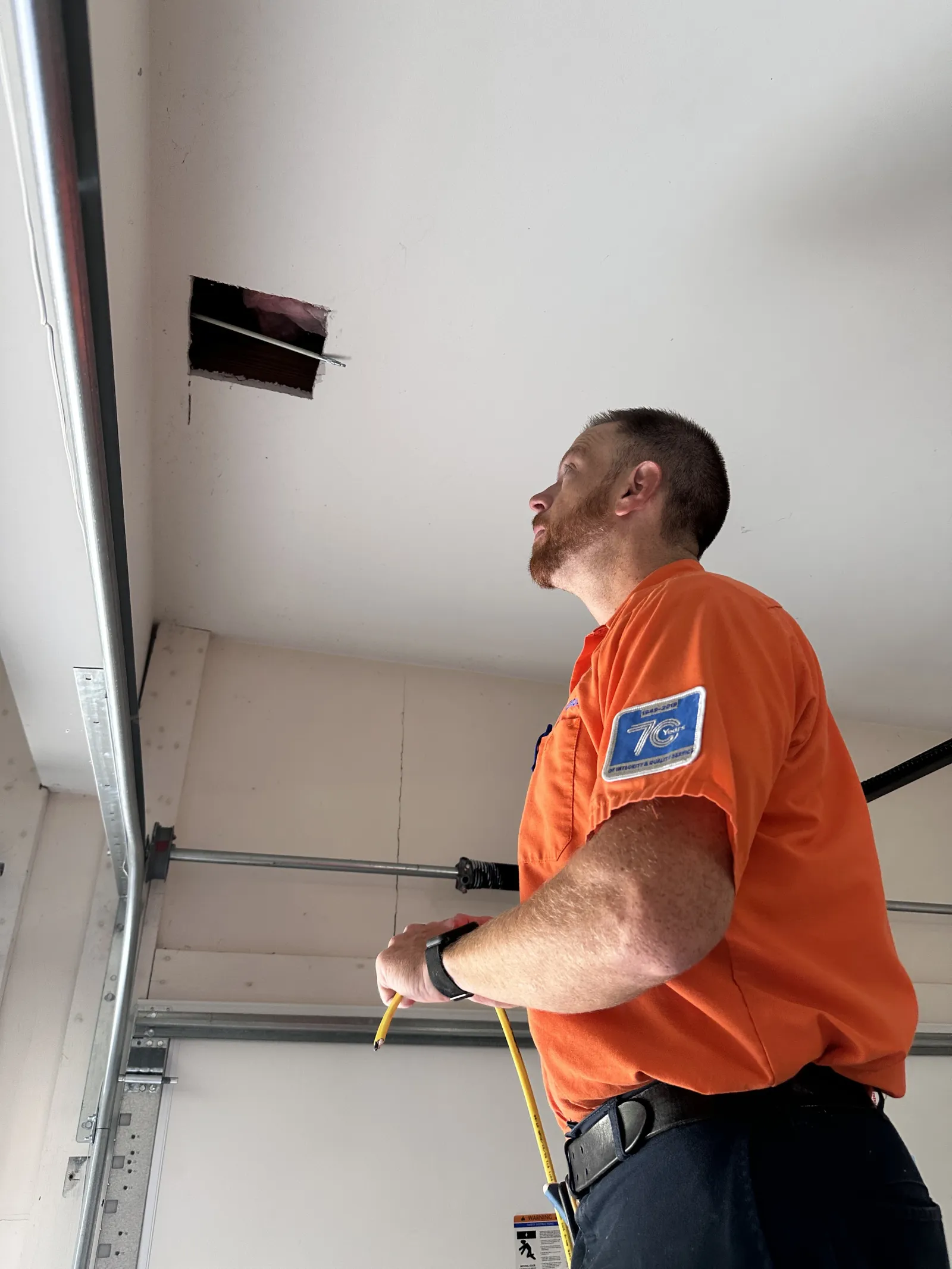 Estes Electrician rewiring a garage space