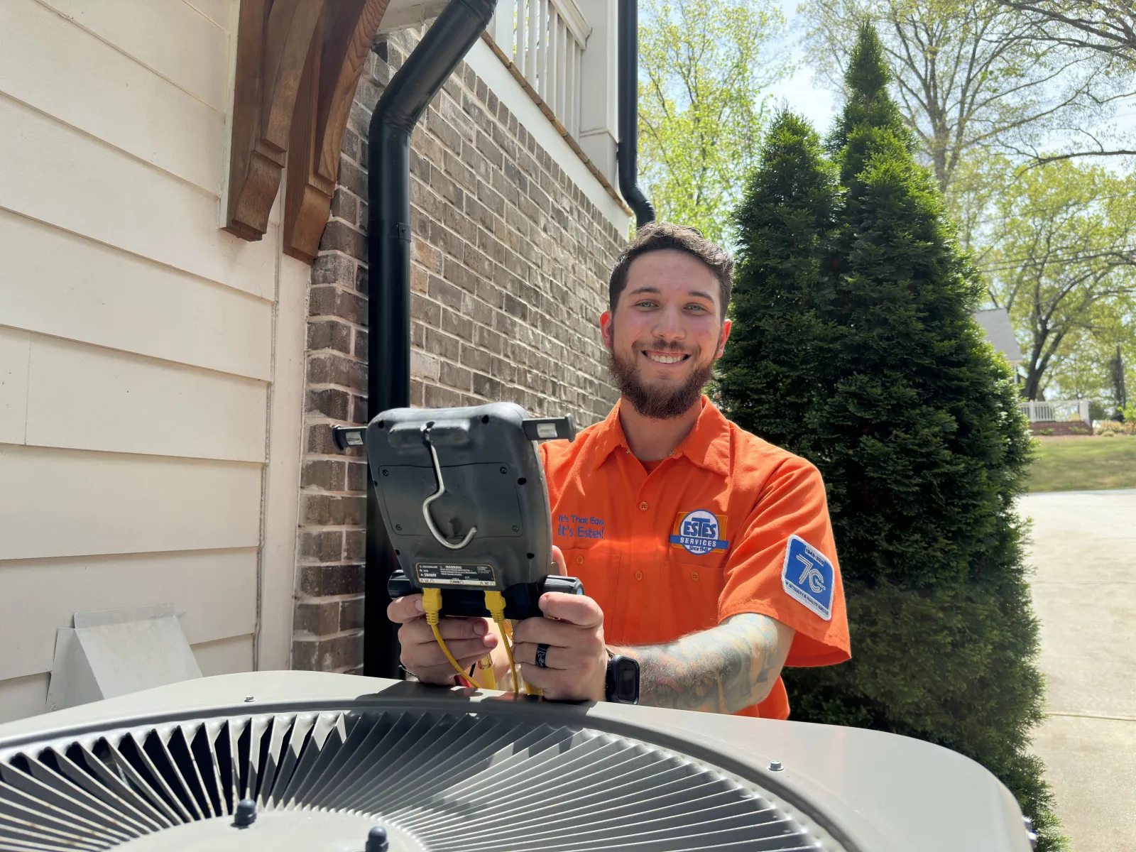 Estes Services Technician checking the AC equipment in Smyrna, Georgia