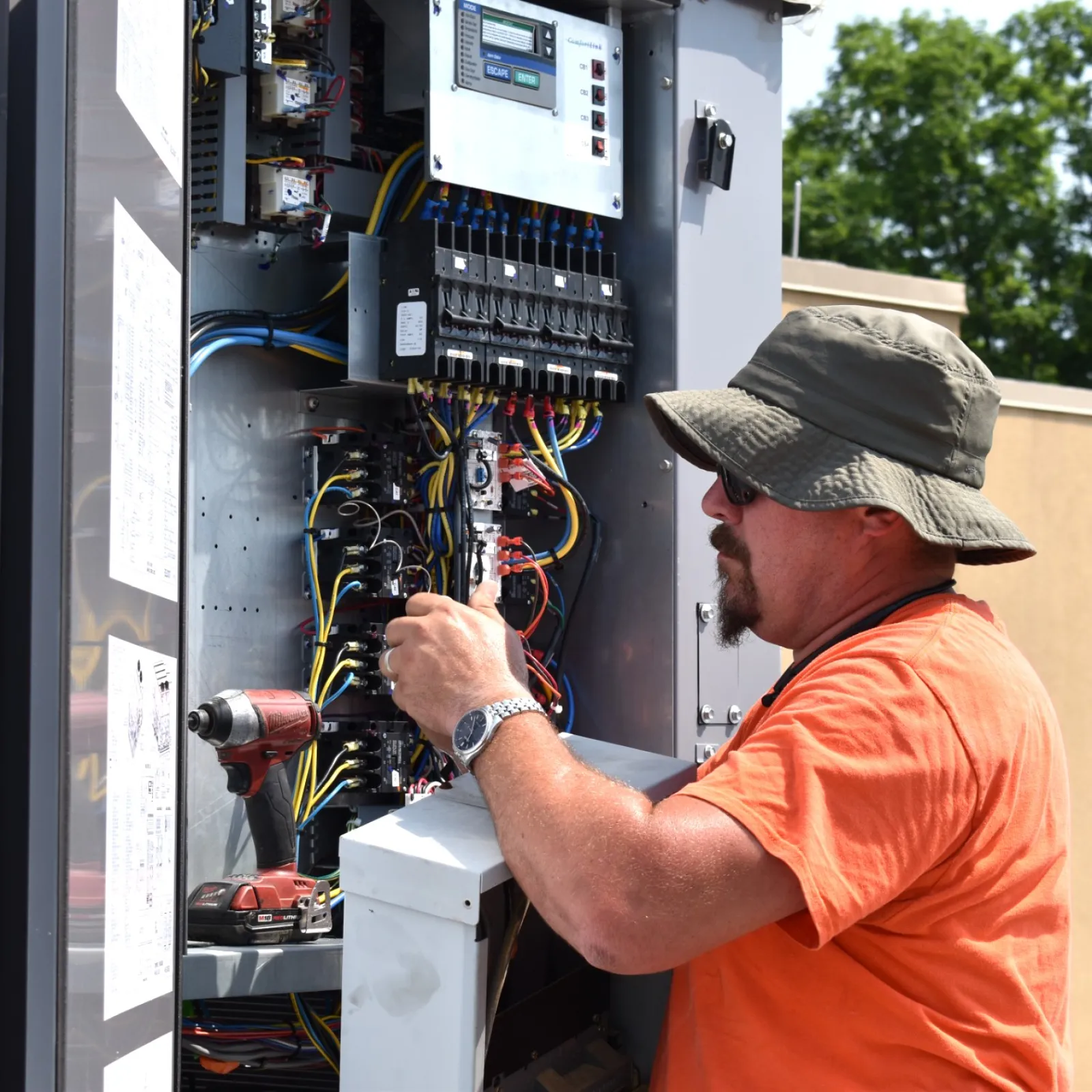a man installing a the building automation