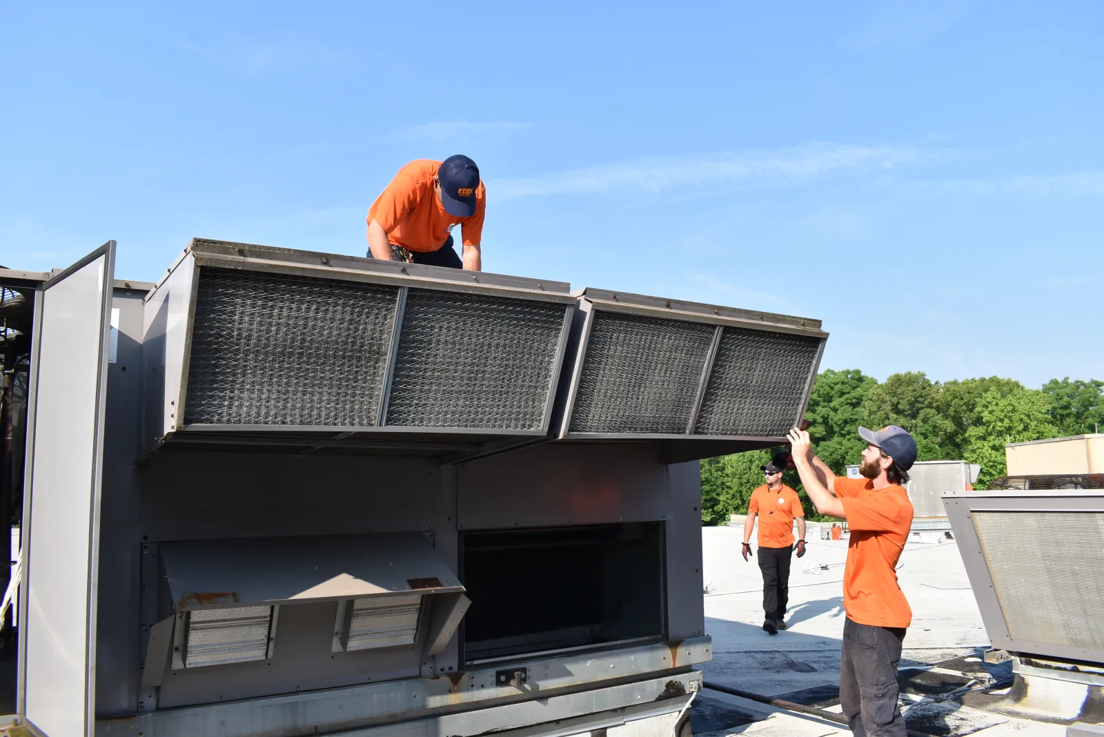 Estes HVAC Commercial Techs working on an unit