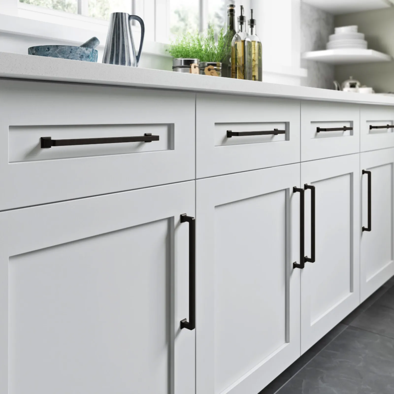 a white kitchen with white cabinets