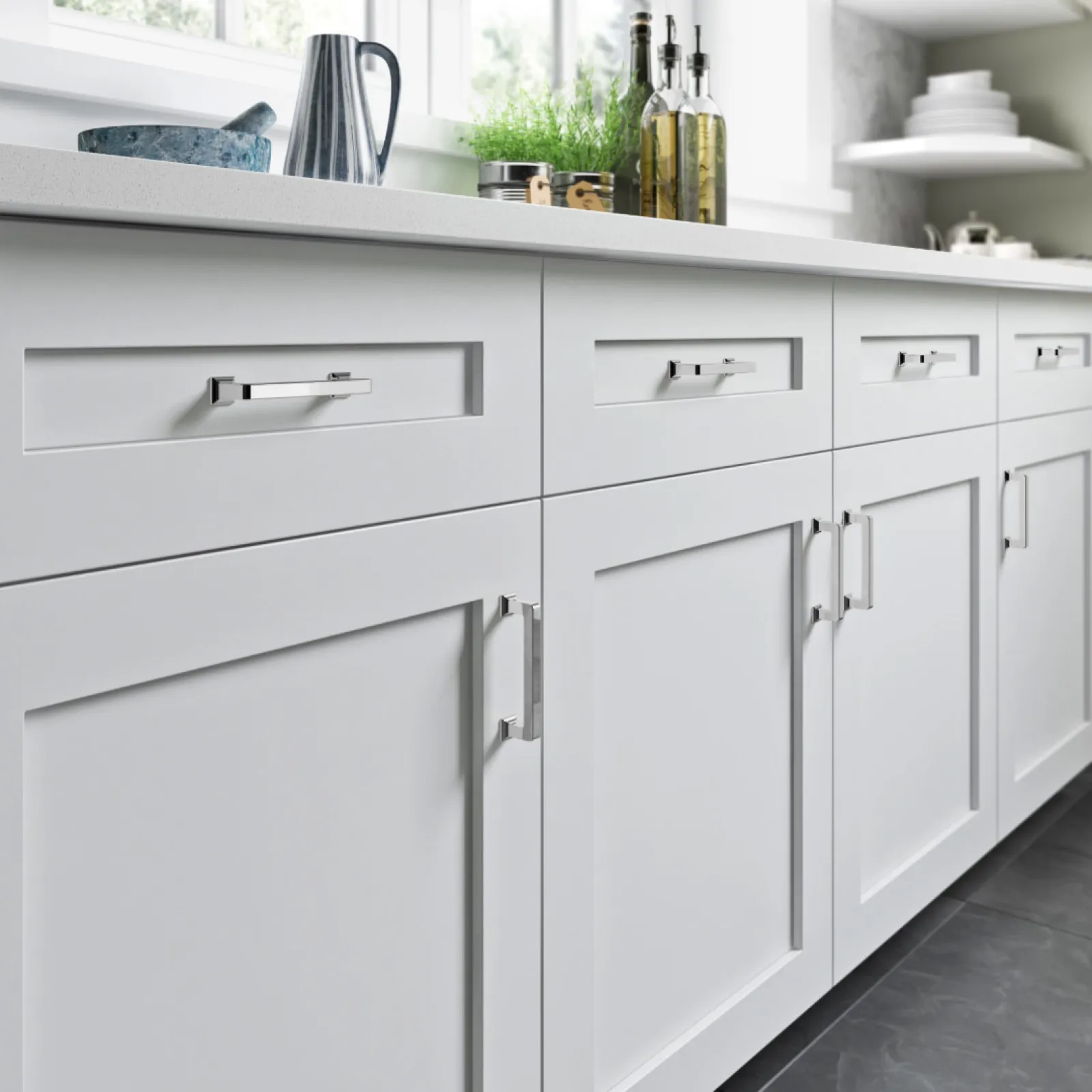 a white kitchen with white cabinets