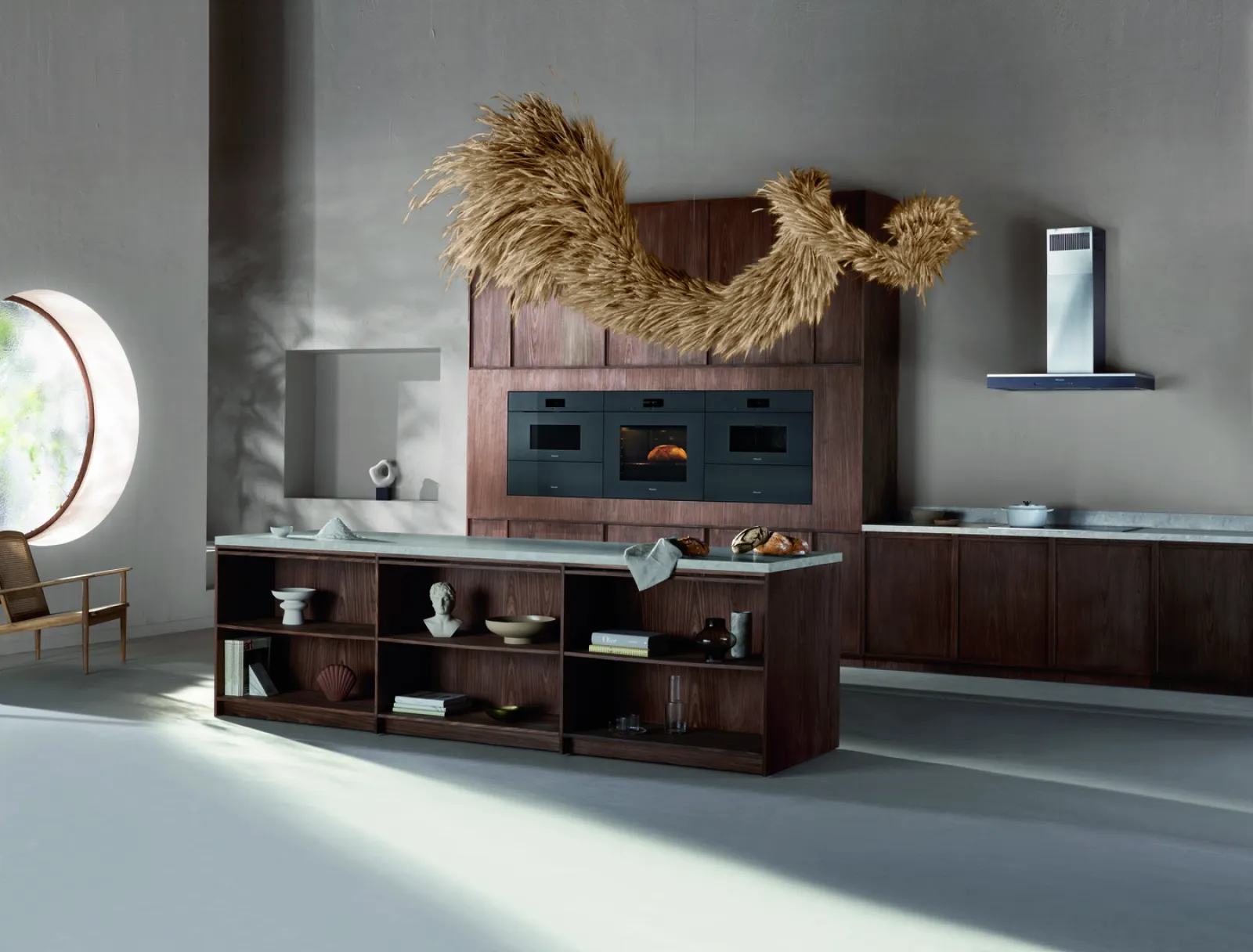 Modern kitchen design featuring wooden cabinetry and artistic decor.