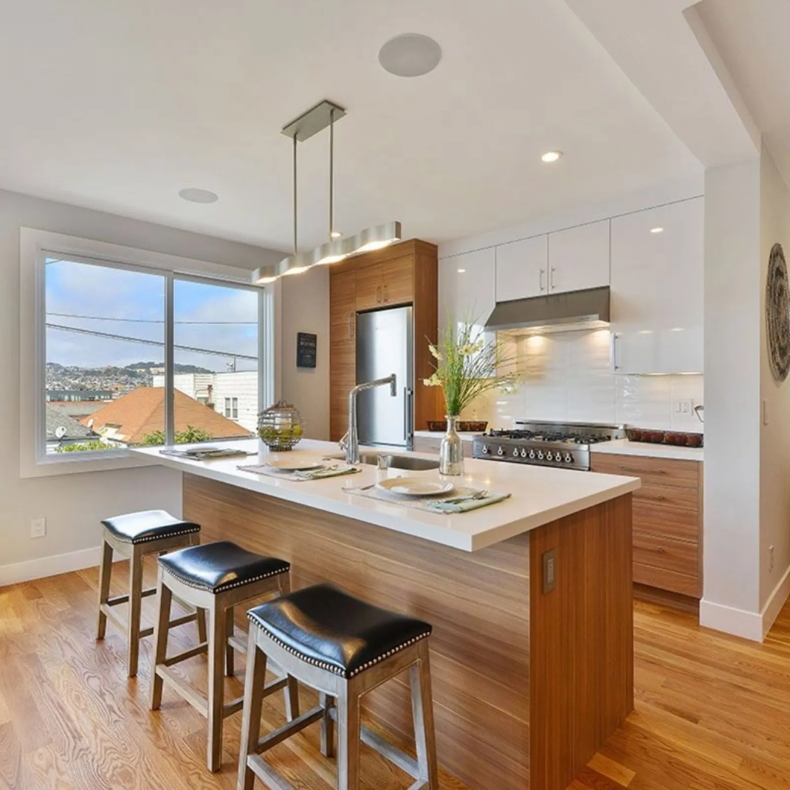 a kitchen with a large window