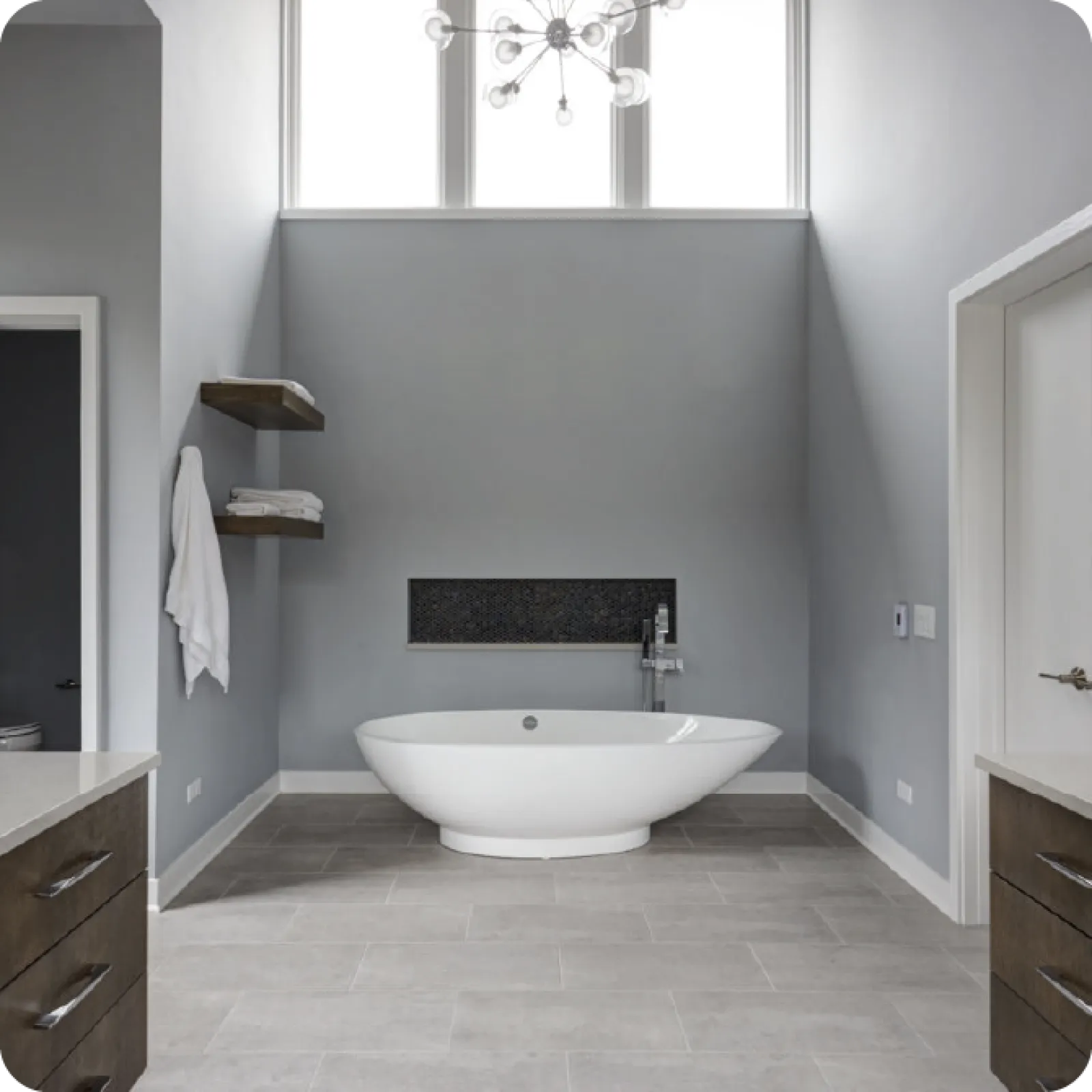 a bathroom with a tub and sink