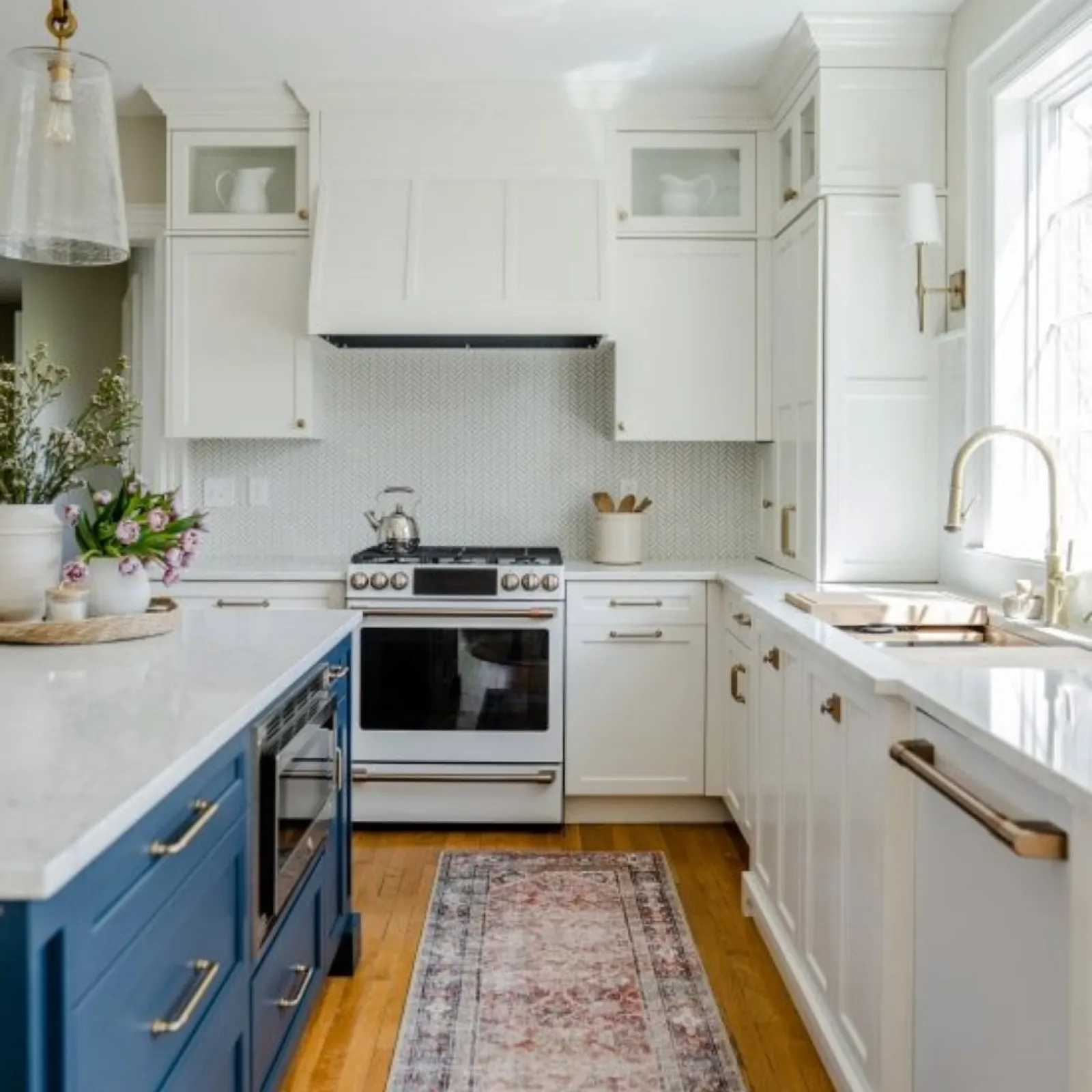 a kitchen with white cabinets