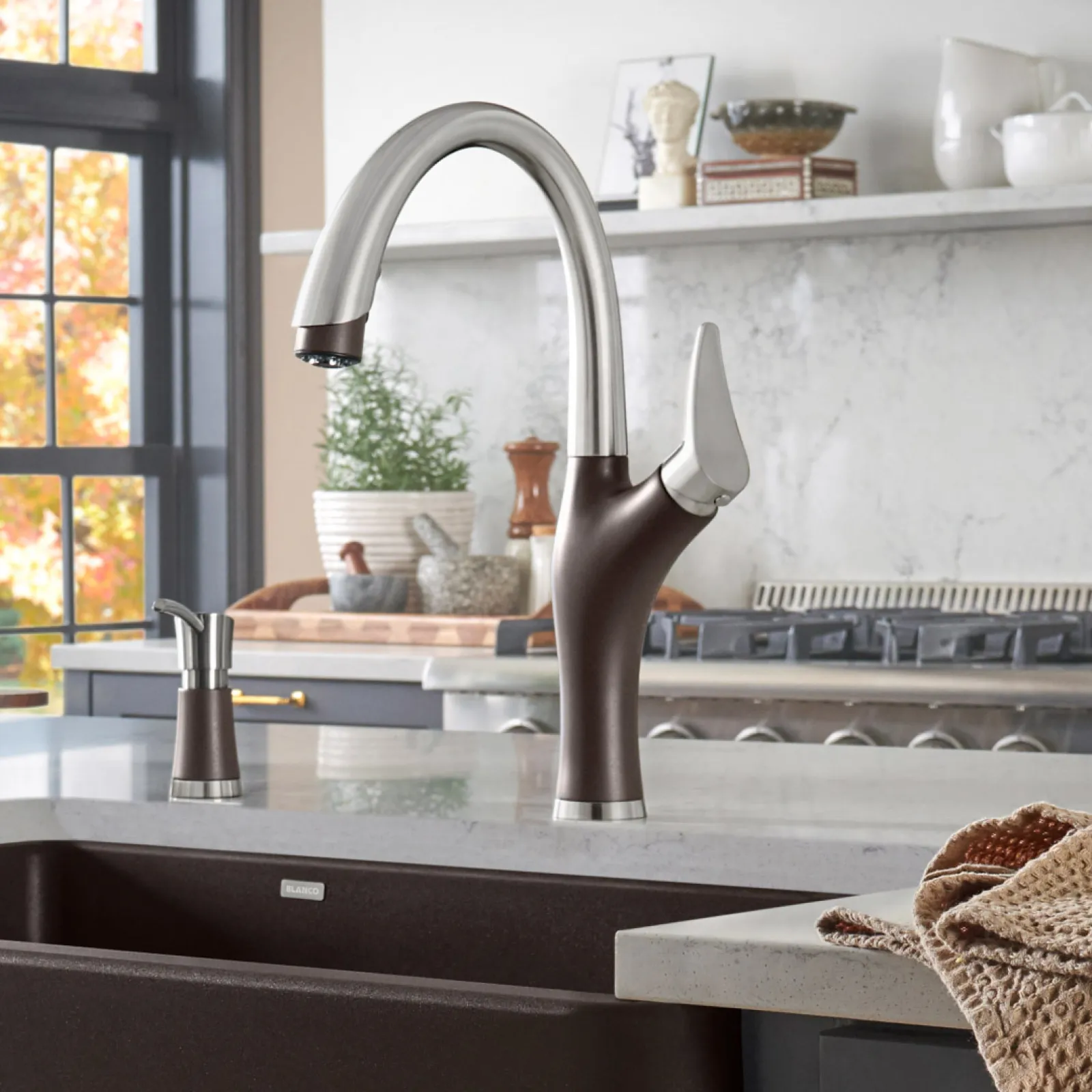 a kitchen sink with a faucet