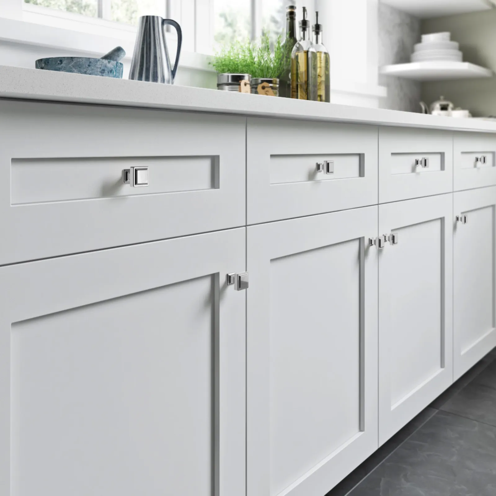 a white kitchen with white cabinets