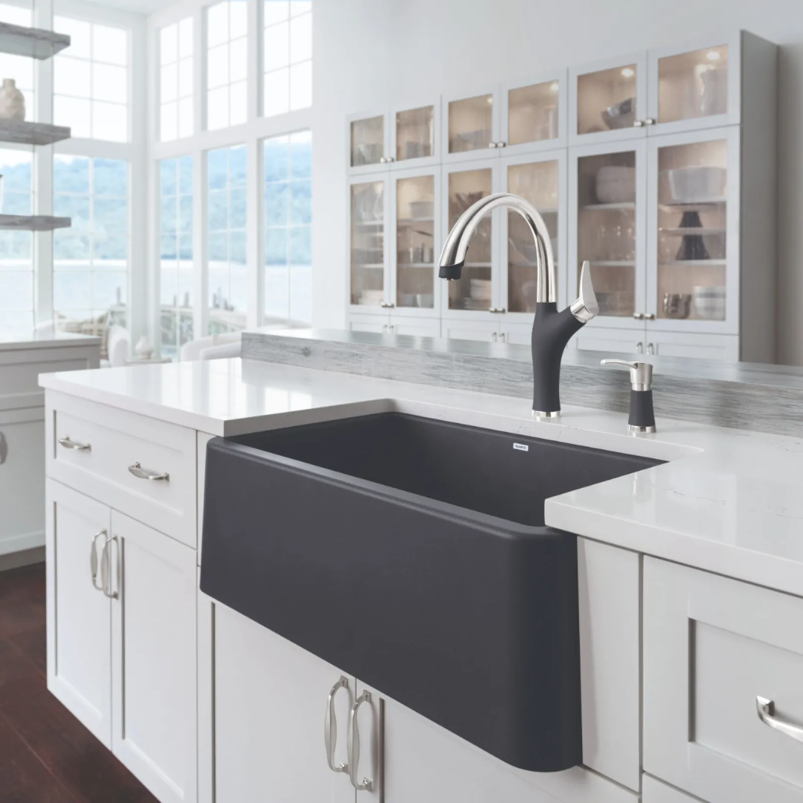 a kitchen with white cabinets