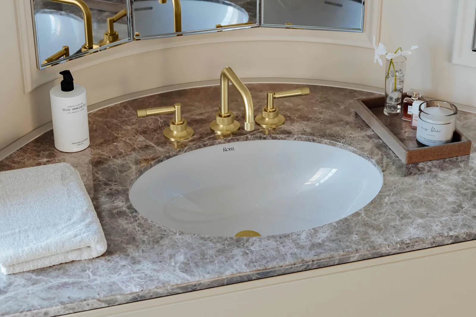 a bathroom sink with a towel