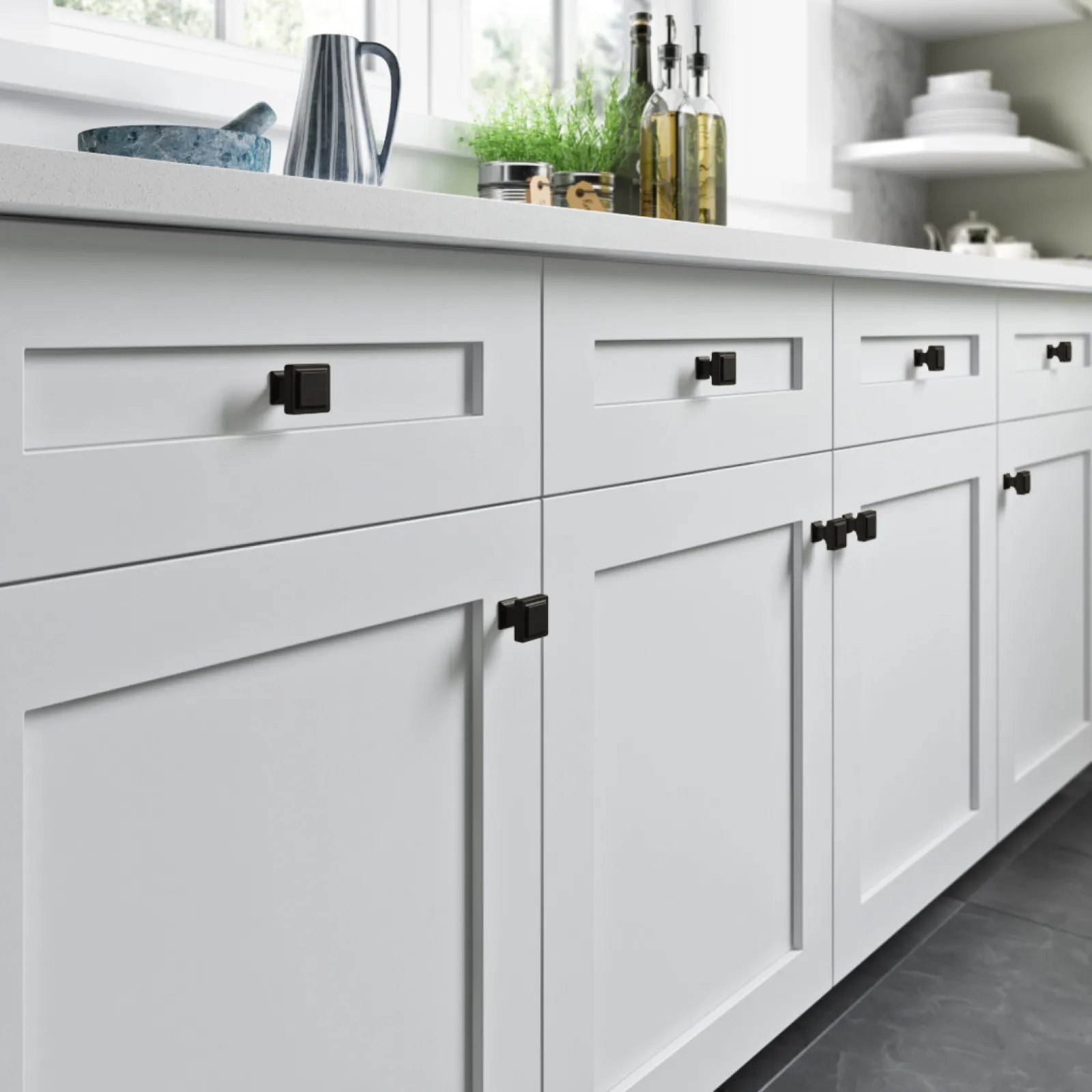 a white kitchen with white cabinets